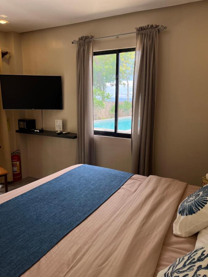 Southseas Beach Resort And Dive Center Santander Zewnętrze zdjęcie
