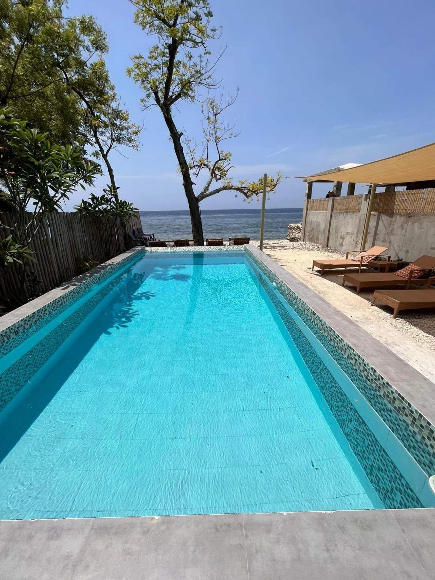 Southseas Beach Resort And Dive Center Santander Zewnętrze zdjęcie